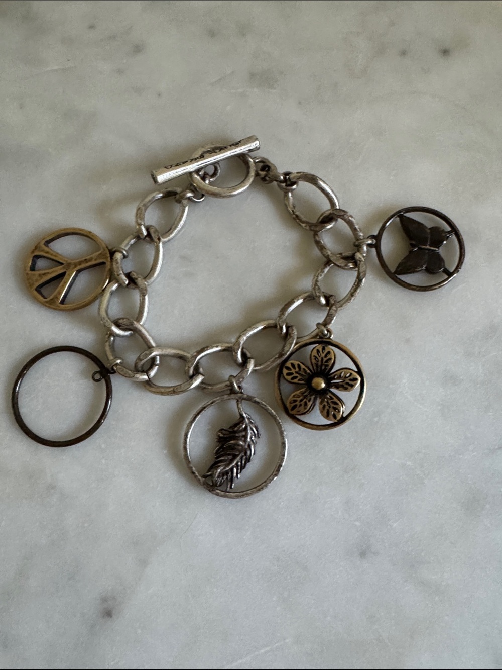 Lucky Brand Silver and Antique Gold Color Multi-Charm Bracelet